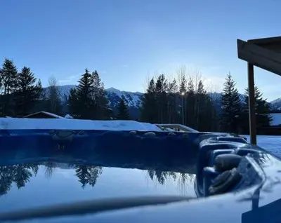 a pool of water with snow on the ground at The White House in Golden