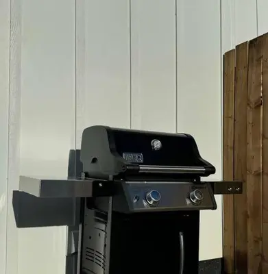 a grill sitting on top of a stove at The White House in Golden
