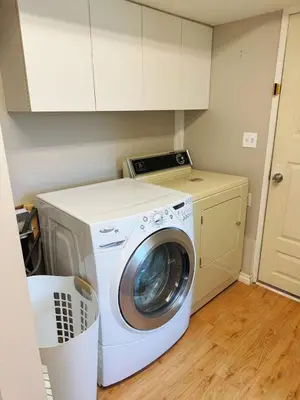 a washer and dryer in a kitchen with at sweet home in Delta