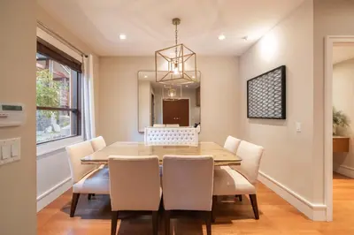 a dining room with a table and chairs at Fitzsimmons Walk 21 by Outpost Whistler in Whistler