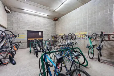 a room with a bunch of bikes parked in it at Cozy Home in Downtown Minutes from Seawall in Vancouver