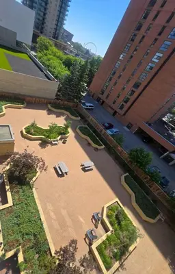 an overhead view of a parking lot in a city at Suite near Downtown, BMO, Stampede, Free Parking in Calgary