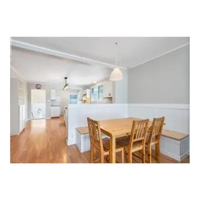 a dining room and kitchen with a table and chairs at Youbou Lakefront Getaway Relax And Unwind in Youbou