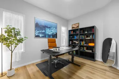 a home office with a desk and a book shelf at The Ultimate Getaway with Central AC, 3 King Beds, Hot Tub, Pool Table and More in Balzac