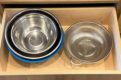 two bowls sitting in a wooden drawer with at RomanticStylish|FreeWifi|KingBed|WEM|parking in Edmonton