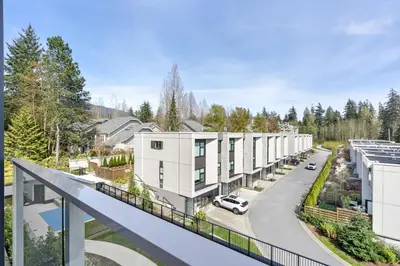 arial view of a apartment complex with a street at Modern North Shore Nest with Balcony in North Vancouver