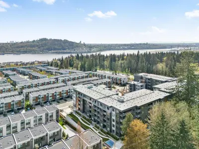 an aerial view of an apartment complex with a lake at Modern North Shore Nest with Balcony in North Vancouver