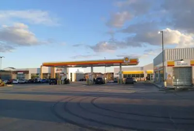 a gas station with a gas station at Apartment In Calgary Near Airport in Calgary