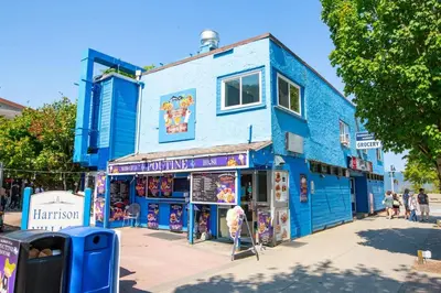 a blue building on the side of a street at Studio w Balcony with Smart TV and 2 Min Walk to Lake in Harrison Hot Springs