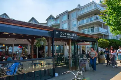 a coffee shop with people standing outside of it at The Backyard at Cedar Springs Walk to Lake and Hot Springs in Harrison Hot Springs