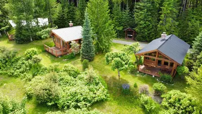 an aerial view of a house in the woods at Wing Creek Resort in Kaslo