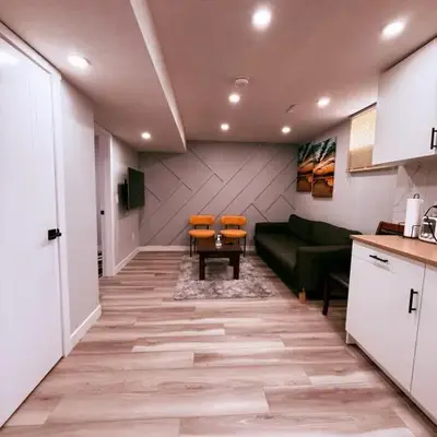Spacious 2 bedroom 3 beds lower unit with separate entrance and parking space Near Downtown