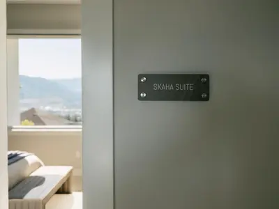 a door with a sign that reads swan suite at Bialto Bed and Breakfast in Penticton