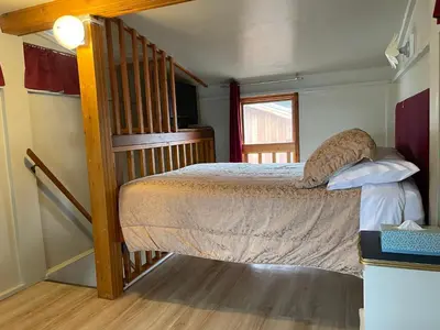 a bedroom with a bunk bed in a house at Luna Bed & Breakfast in Grand Forks