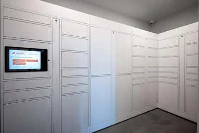 a white closet with a tv on the wall at AQUA Corner Unit w Balcony and Amazing View #614 in Kelowna