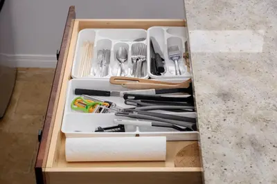 a drawer filled with utensils in a kitchen at Cozy 1BR BSMT Escape Large Free Parking in Coquitlam