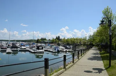 a marina with many boats in the water at Holiday Inn Express & Suites Cold Lake by IHG in Cold Lake