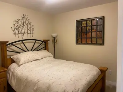 a bedroom with a bed and a window at Remo Ridge Bed N Breakfast in Terrace