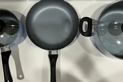 a group of kitchen utensils on a white table at Home in west Edmonton in Edmonton
