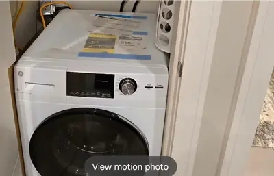 a washer and dryer in a room at Golden Acreage Getaway 2 Bedroom in Balzac