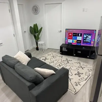 Cozy Inn new basemt wt sep entrance contains 1 bdrm and den for up to 4 guests