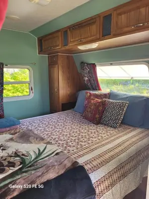 a bed in the back of an rv at Rara's secret nest in Aiyansh
