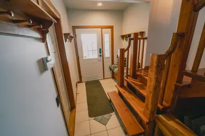 an overhead view of a hallway in a house at Snow Reason A in Big White