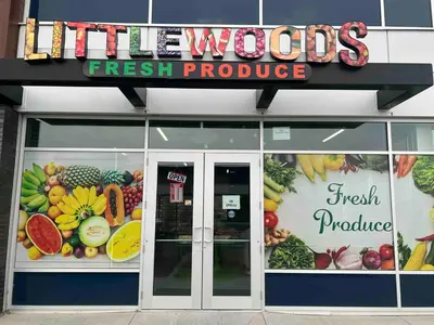 a store with a sign that reads lleeds fresh produce at 1-BR Suite with Private entrance near Restaurants, Shops, Local Amenities in Edmonton