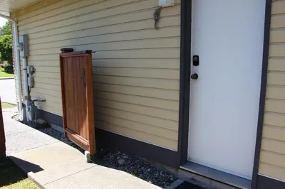 a door on the side of a house at Guest Suite in Maple Ridge in Maple Ridge District Municipality