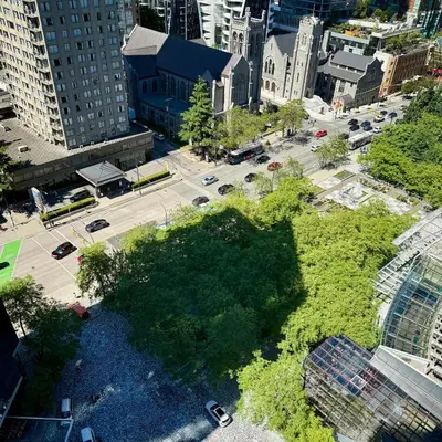 an aerial view of a street in a city at Sea to Sky Studio with Mountain and City Views in Vancouver