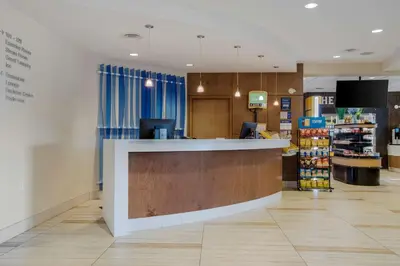 a grocery store with a counter in a store at Best Western Plus Sawridge Suites in Fort McMurray