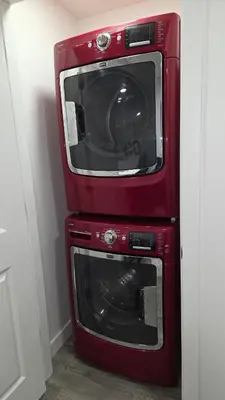 two microwaves stacked on top of each other at Modern 2BR near Hospital, YMCA, Stores in Calgary