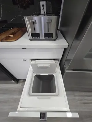 a kitchen counter with a pot on top of it at The Walkout at the Ravine in Edmonton
