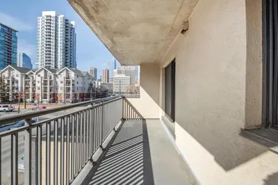 a balcony with a view of the city at YYC HiddenGem in Calgary