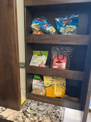 a book shelf filled with different types of food at A Gorgeous Mansion for Jasper Vacation in Hinton