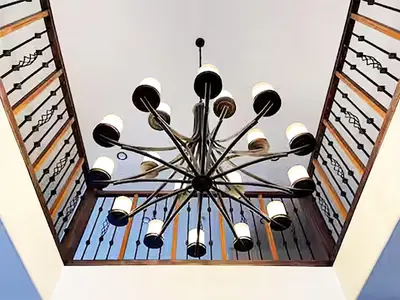 a chandelier hanging from the ceiling of a room at A Gorgeous Mansion for Jasper Vacation in Hinton
