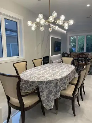 a dining room with a table and chairs at 3 bed duplex in Kitsilano 10 min to airport and 10 min to downtown in Vancouver