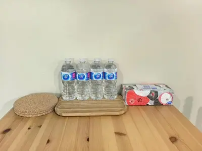 a group of bottles of water sitting on a table at Private Cozy 2bdrm Sleep5pp Metrotown! Free Parking! Self Check-in! in Burnaby