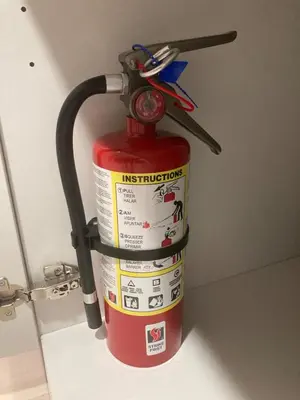 a fire extinguisher on top of a fire hydrant at Cozy 2BR Basement Rosenthal Stay by WEM with private entrance in Edmonton