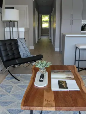 a living room with a coffee table and a couch at Lakeview Hideaway in Victoria