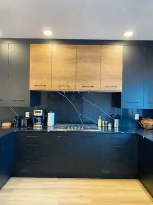 a kitchen with blue cabinets and blue counters at NEW Luxury Family Friendly Entire House Near Downtown WEM, 3 Bedrooms in Edmonton