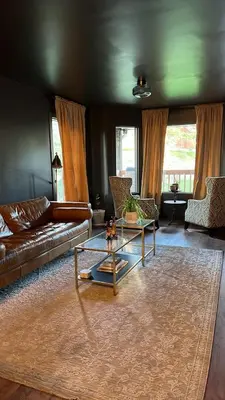 a living room with a couch and a coffee table at Wilder Lodge in Fairmont Hot Springs