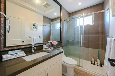 a bathroom with a sink and a shower and a toilet at #3 Room in Richmond