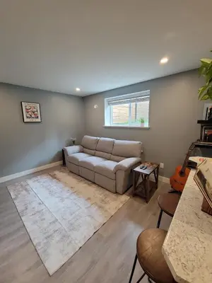 a living room with a couch and a rug at Cowichan Valley Retreat with Sauna & Free EV Charger in Duncan