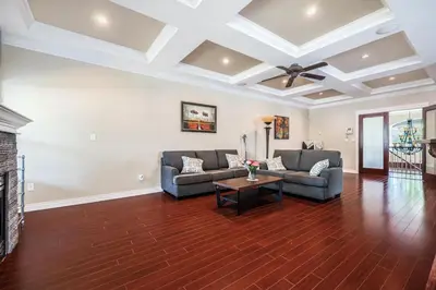a living room with two couches and a fireplace at Coquitlam Heights Private Room in Coquitlam