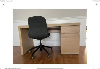 a desk with a chair sitting next to a drawer at Luxury New 5-bedroom 4- bathroom Single House in Surrey
