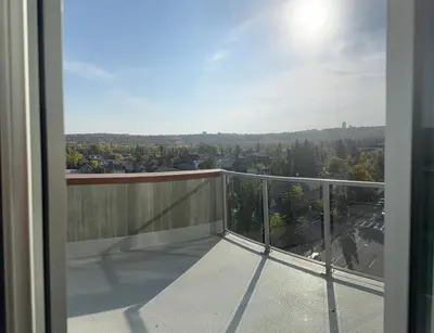 a balcony with a view of a city at Calgary place in Calgary