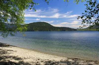 a view of a large body of water with a mountain at Casa del Mar Villa in North Vancouver