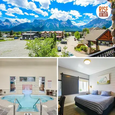 a home with a pool and mountains in the background at Cozy King Condo Mountain Views, Resort Perk and BBQ in Canmore