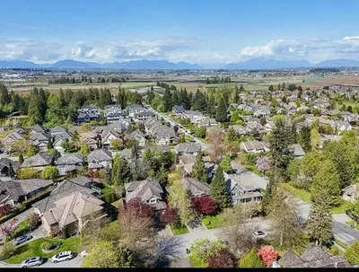 an aerial view of a residential neighborhood with houses at Bella Sweet Suite -Cozy 2B suite Morgan Creek in Surrey